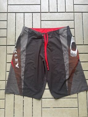 Oakley Black Board Shorts with Red Accent Drawstring